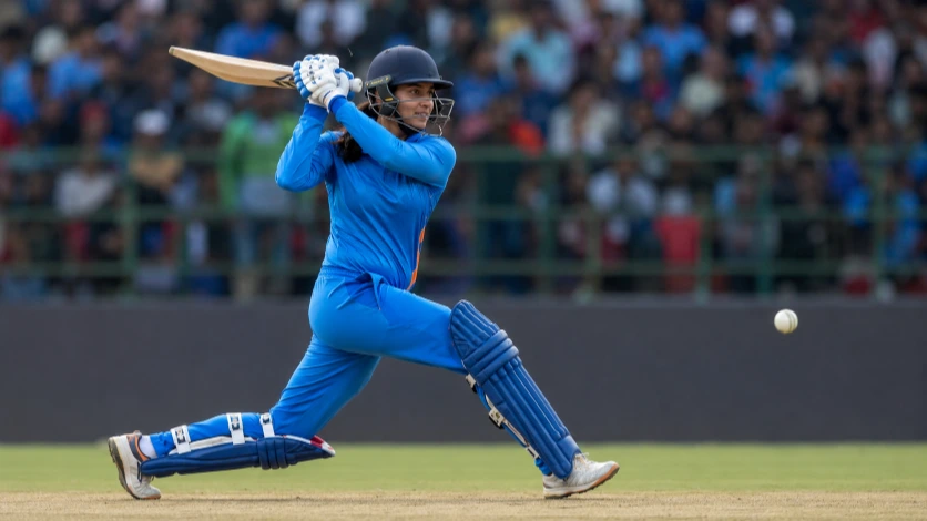 Smriti Mandhana batting for India during an international women's cricket match.