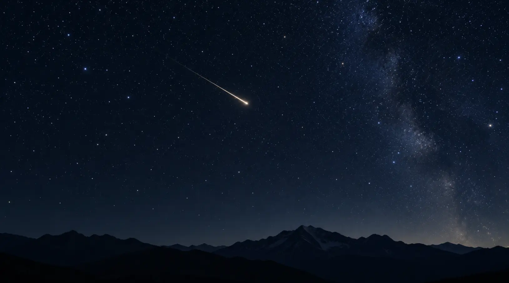 A bright meteor streak across a star-filled sky above a dark landscape.