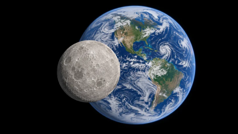 The sunlit far side of the Moon passing in front of Earth.